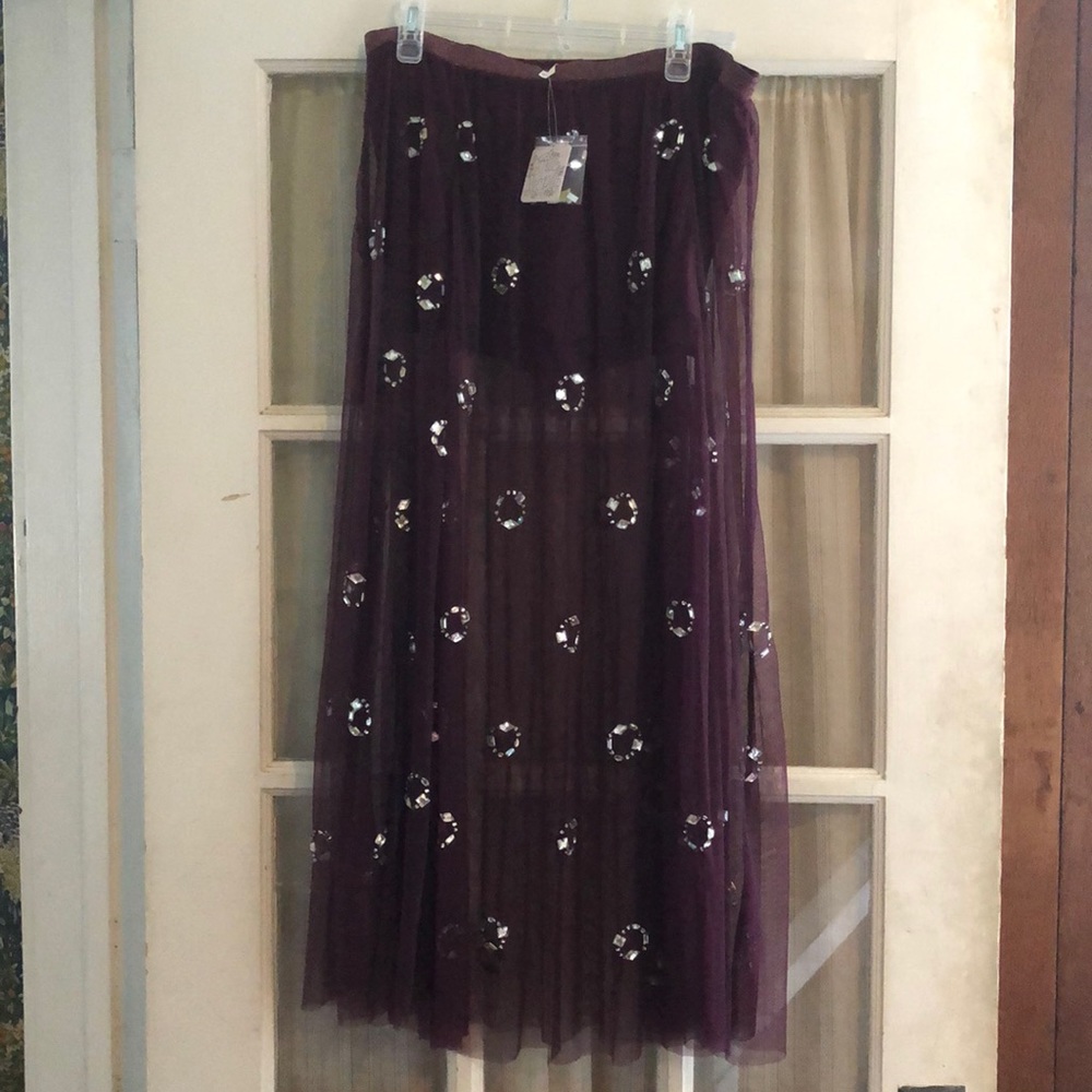 Free People - sheer skirt with shorts attached.